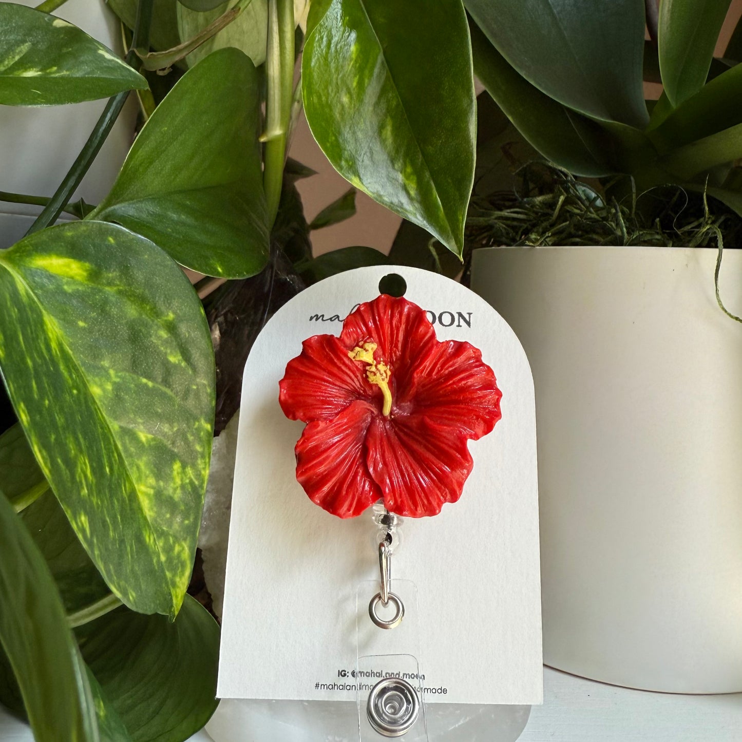 Hibiscus badge reel