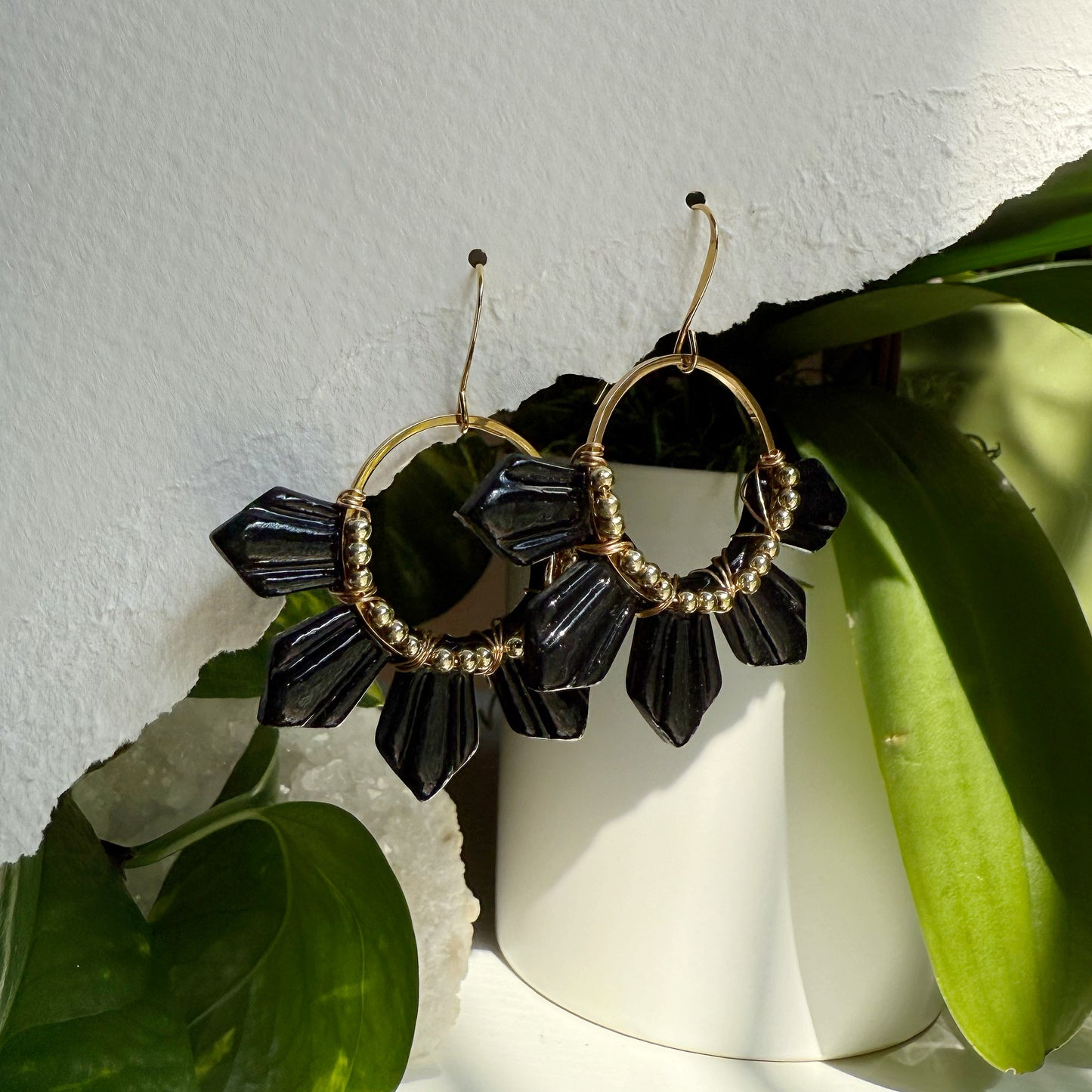 Half araw earrings