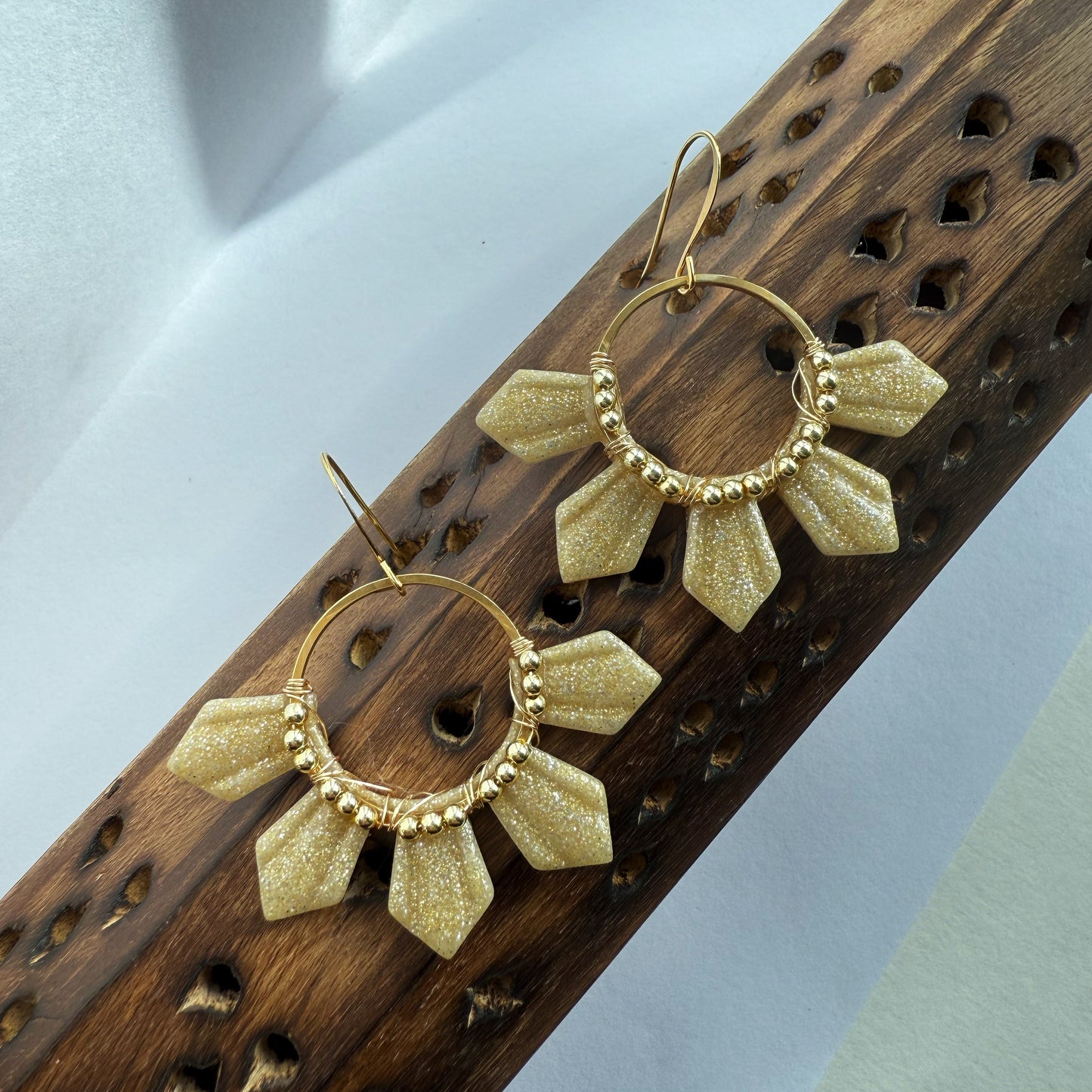 Half araw earrings