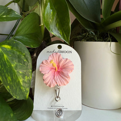 Hibiscus badge reel