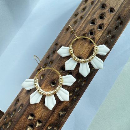 Half araw earrings